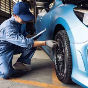 Maintenance Male Checking Tire Service Via Insurance System At Garage